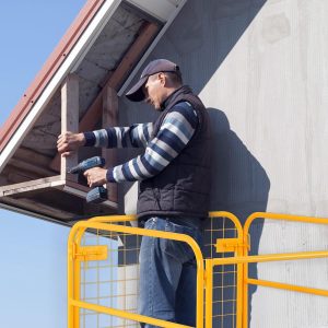 Forklift cage with safety chain
